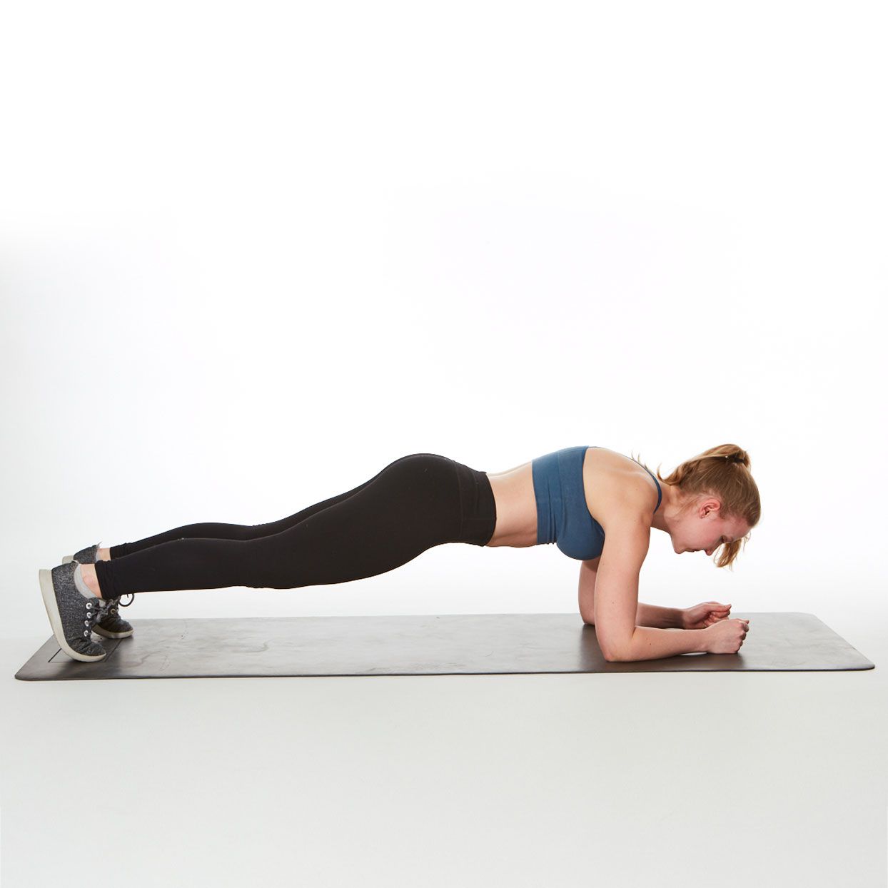 Woman performing plank exercise