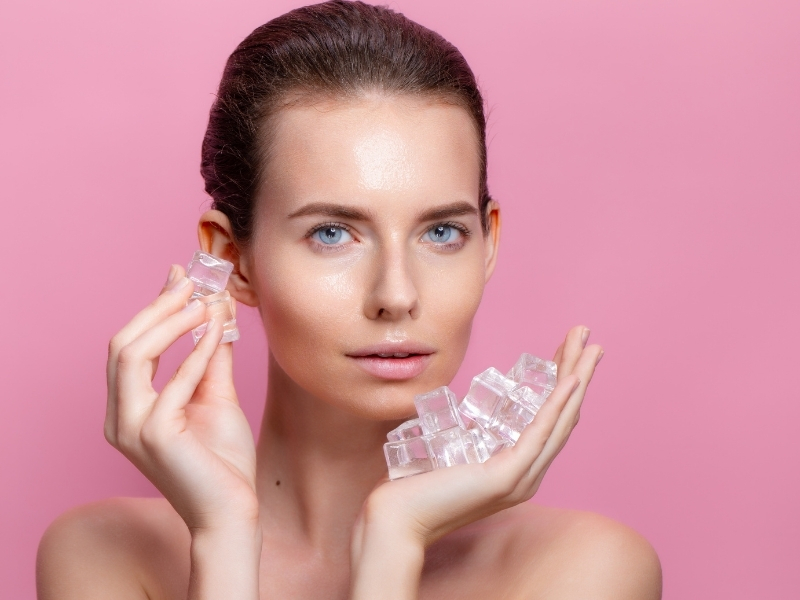 woman using cold compress for puffy eyes