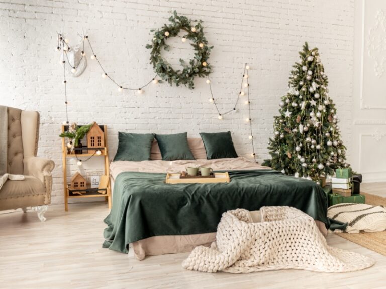 Cozy holiday bedroom decor ideas for a warm Christmas vibe with festive bedding, lights, and seasonal accents