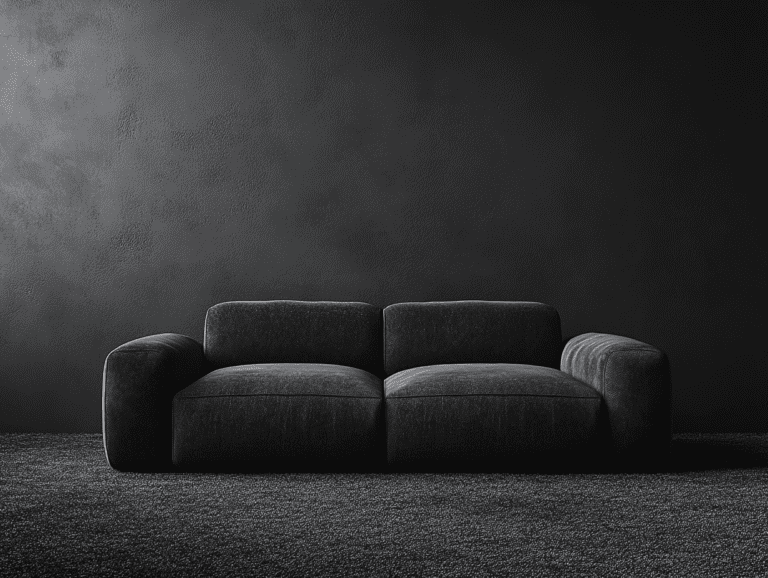 Charcoal gray fabric single sofa on a carpet in front of a textured dark gray wall, showcasing modern minimalist design elements and soft texture against a clean backdrop, high-resolution photography, product shot, hyper-realistic details.